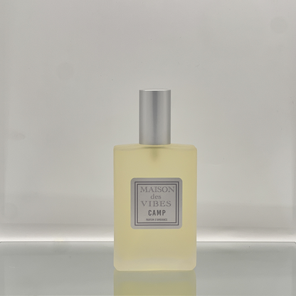 Maison des Vibes CAMP Room Spray. Notes Top: Bergamot, Elemi Heart: Beeswax, Tobacco, Sage Base: Myrrh, Patchouli. Relish in CAMP and let your imagination run wild with stories of past adventures and dreams of future escapades.
